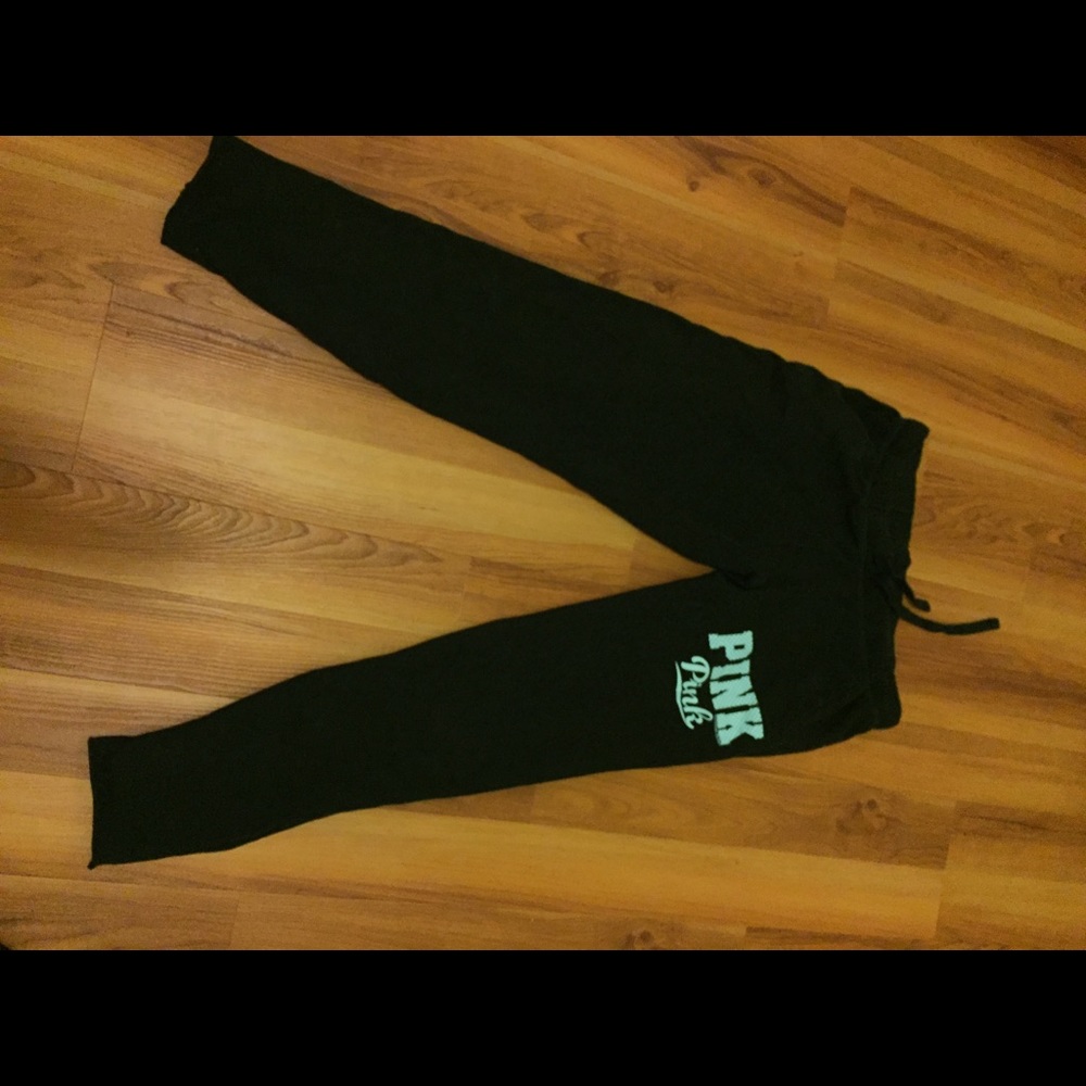 Pink sz Med Black sweatpants with aqua words